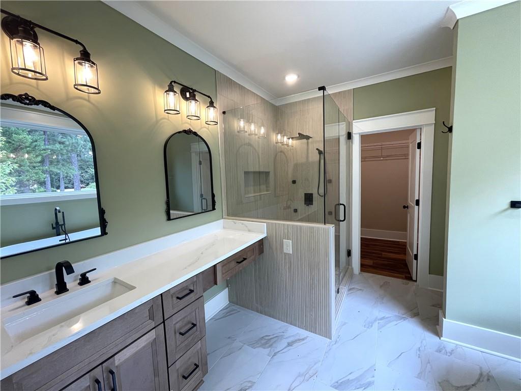 500 Mill Farm Lane Monroe, GA 30655 - Photo 23 of 35 a spacious bathroom with double vanity and a mirror