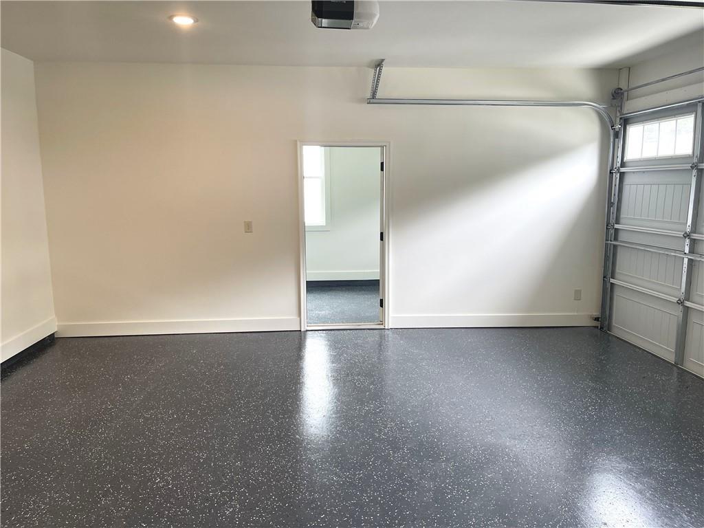 500 Mill Farm Lane Monroe, GA 30655 - Photo 33 of 35 an empty room with wooden floor and windows