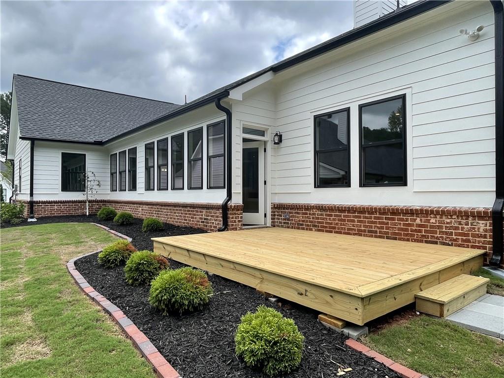 500 Mill Farm Lane Monroe, GA 30655 - Photo 35 of 35 a view of a house with backyard and sitting area