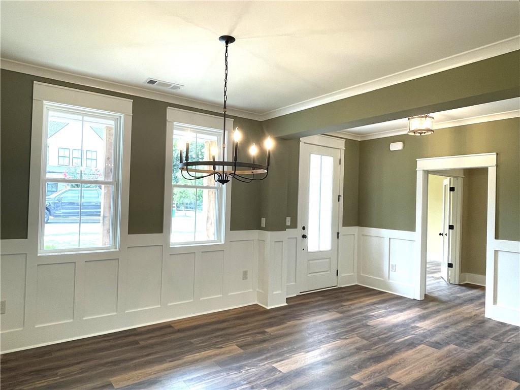 500 Mill Farm Lane Monroe, GA 30655 - Photo 5 of 35 a view of empty room with wooden floor and fan