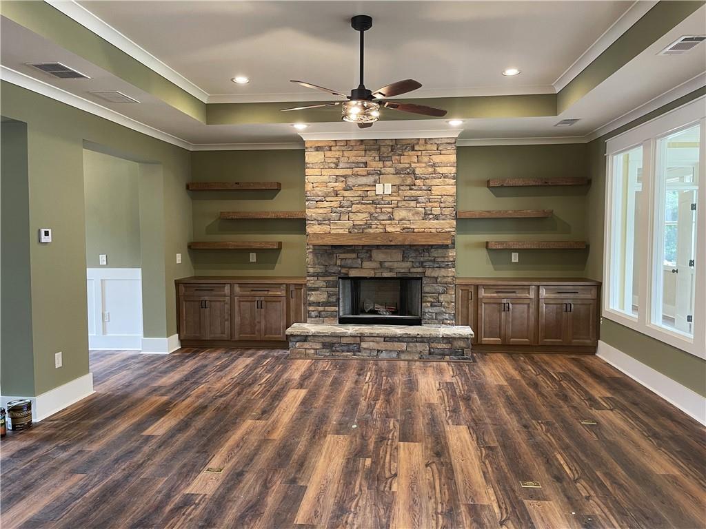 500 Mill Farm Lane Monroe, GA 30655 - Photo 7 of 35 a view of an empty room with a fireplace and a window