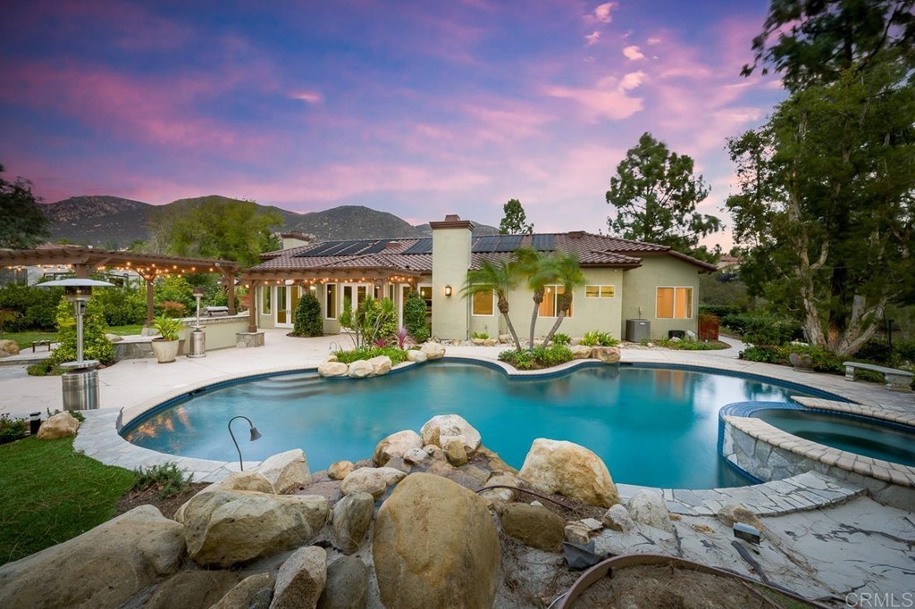 14608 Hidden Wood Road Jamul, CA 91935 - Photo 1 of 1 a view of a swimming pool and lounge chairs