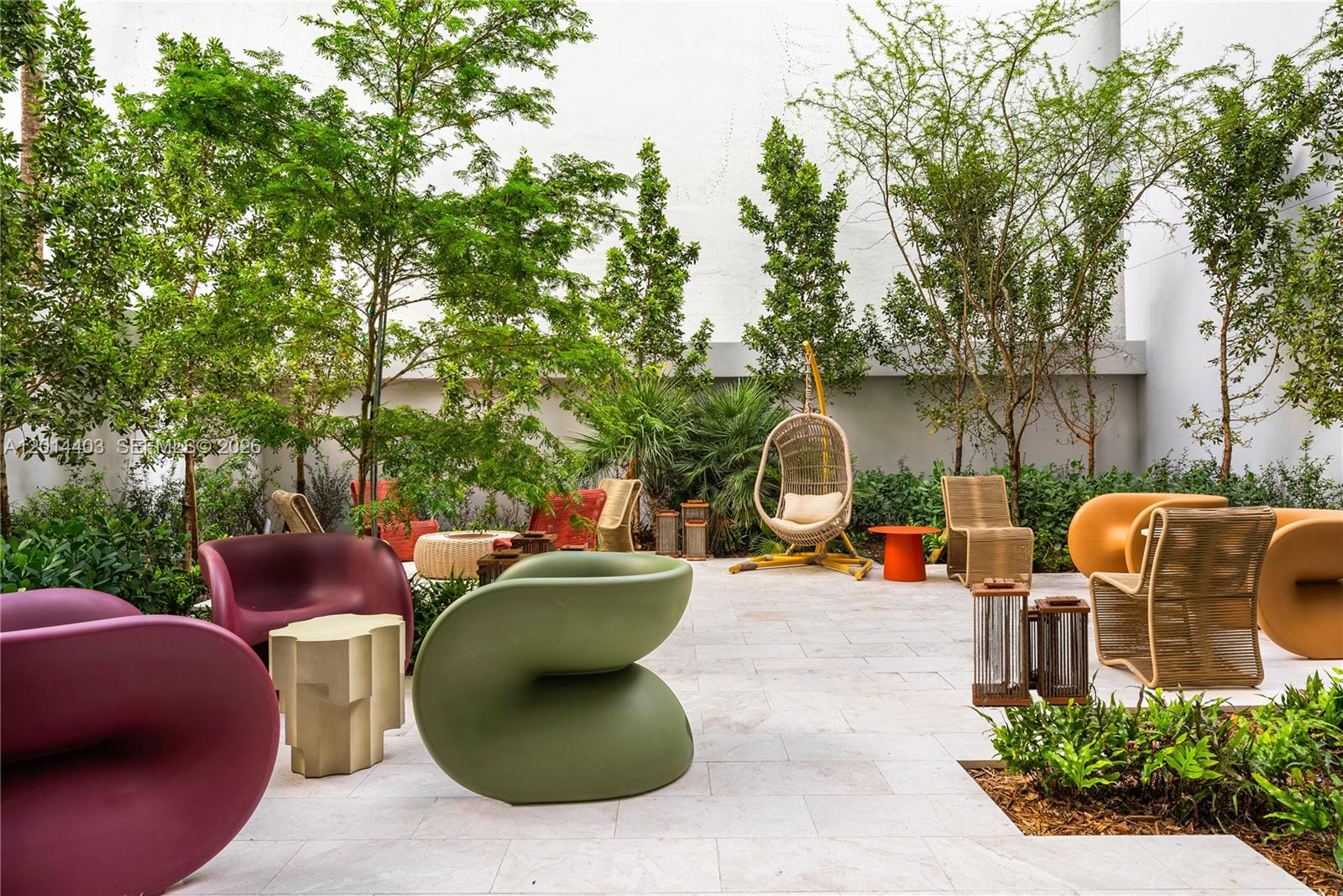 1611 Southwest 2nd Avenue, Unit 314 Miami, FL 33129 - Photo 13 of 16 an outdoor sitting area with a tub and fire pit