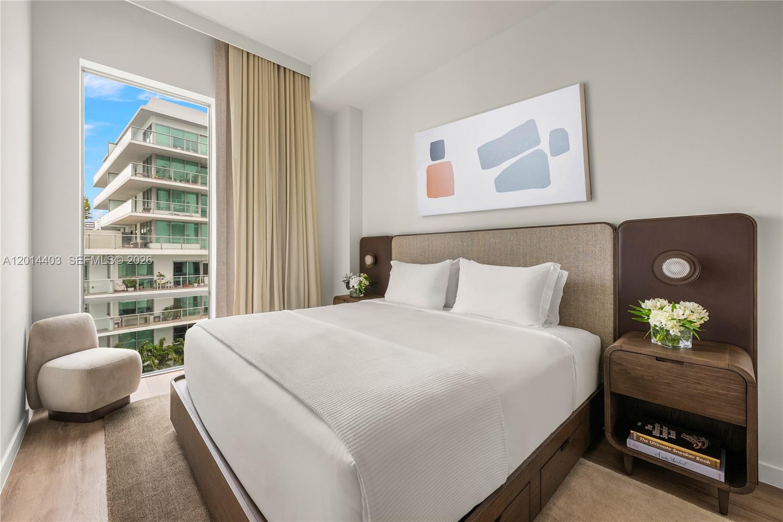1611 Southwest 2nd Avenue, Unit 314 Miami, FL 33129 - Photo 2 of 16 a bedroom with a bed and a couch