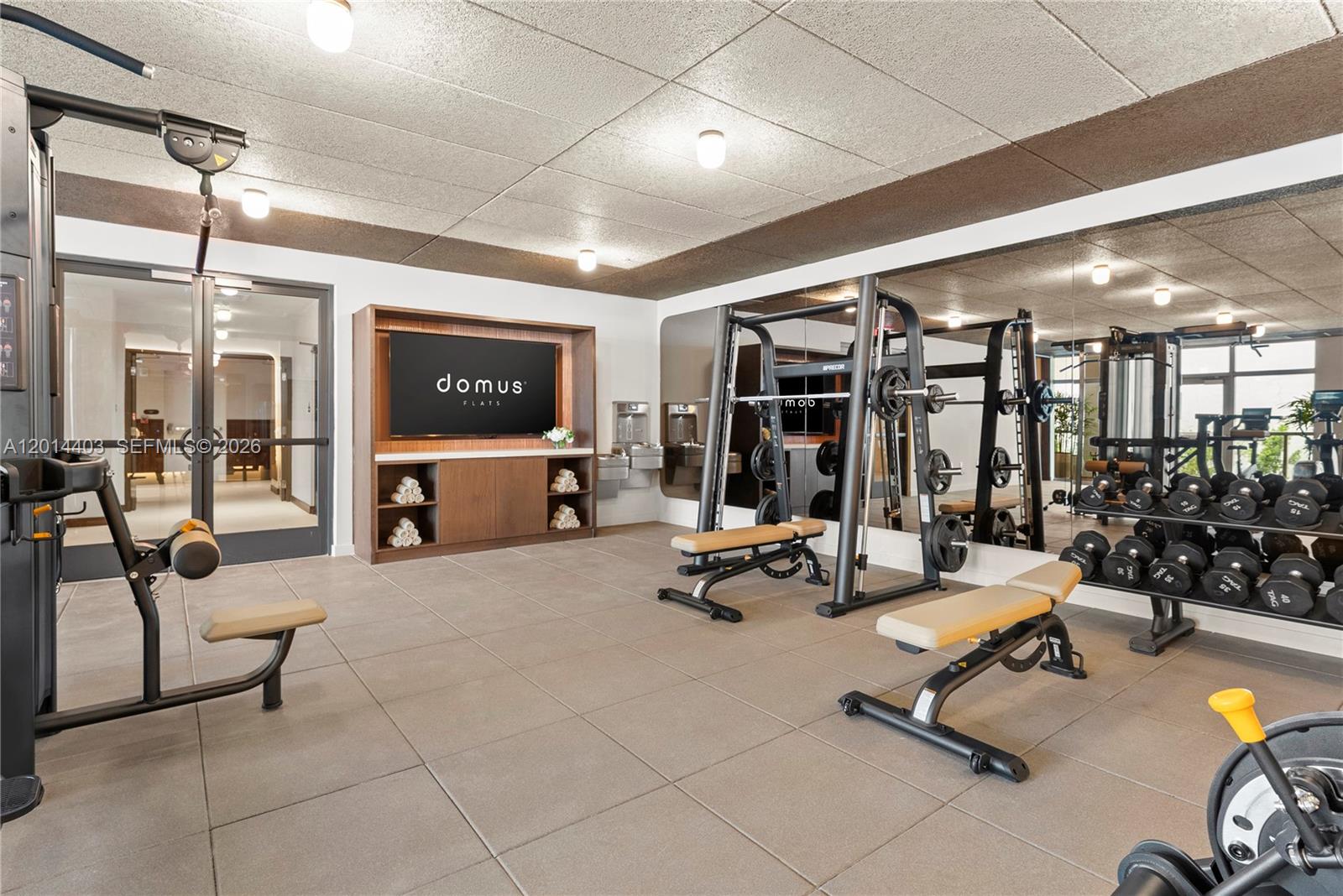 1611 Southwest 2nd Avenue, Unit 314 Miami, FL 33129 - Photo 5 of 16 a view of a room with gym equipment