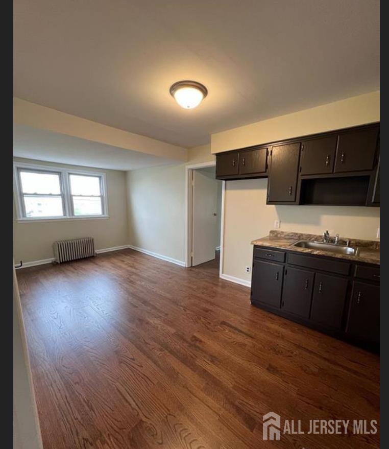 1061 King Georges Post Road Edison, NJ 08837 - Photo 9 of 10 a view of kitchen with microwave and refrigerator
