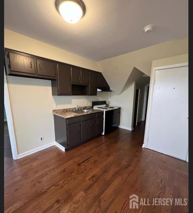 1061 King Georges Post Road Edison, NJ 08837 - Photo 10 of 10 a kitchen with stainless steel appliances granite countertop a stove a sink and a refrigerator