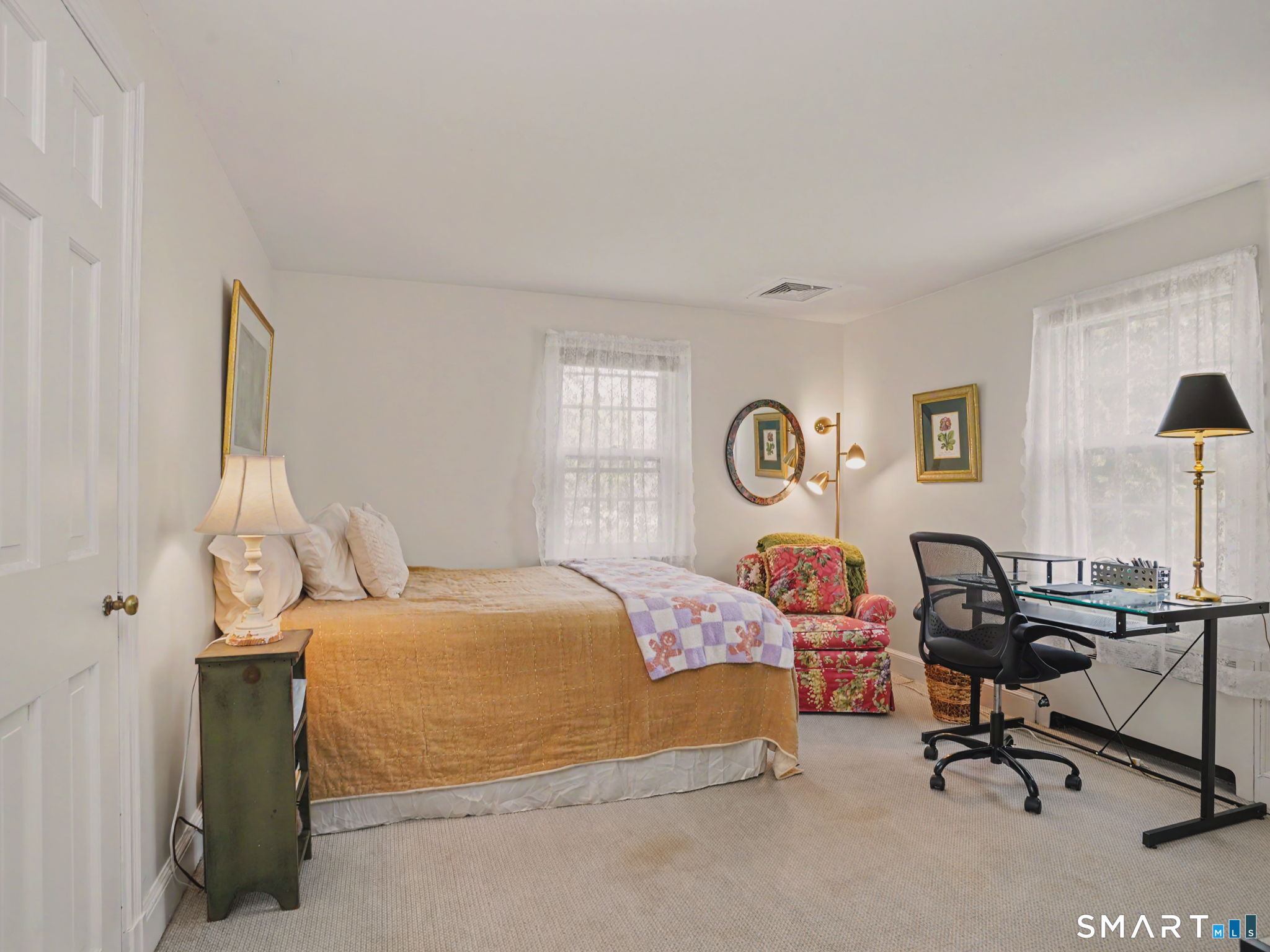 20 Chelsea Street Fairfield, CT 06824 - Photo 13 of 28 a bedroom with a bed and a desk