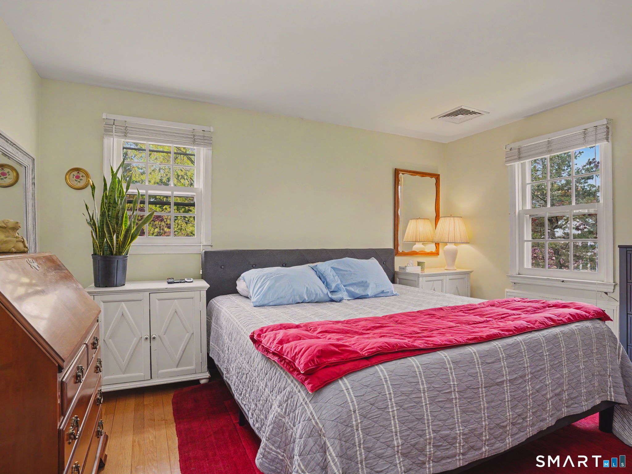 20 Chelsea Street Fairfield, CT 06824 - Photo 14 of 28 a bedroom with a bed and a window