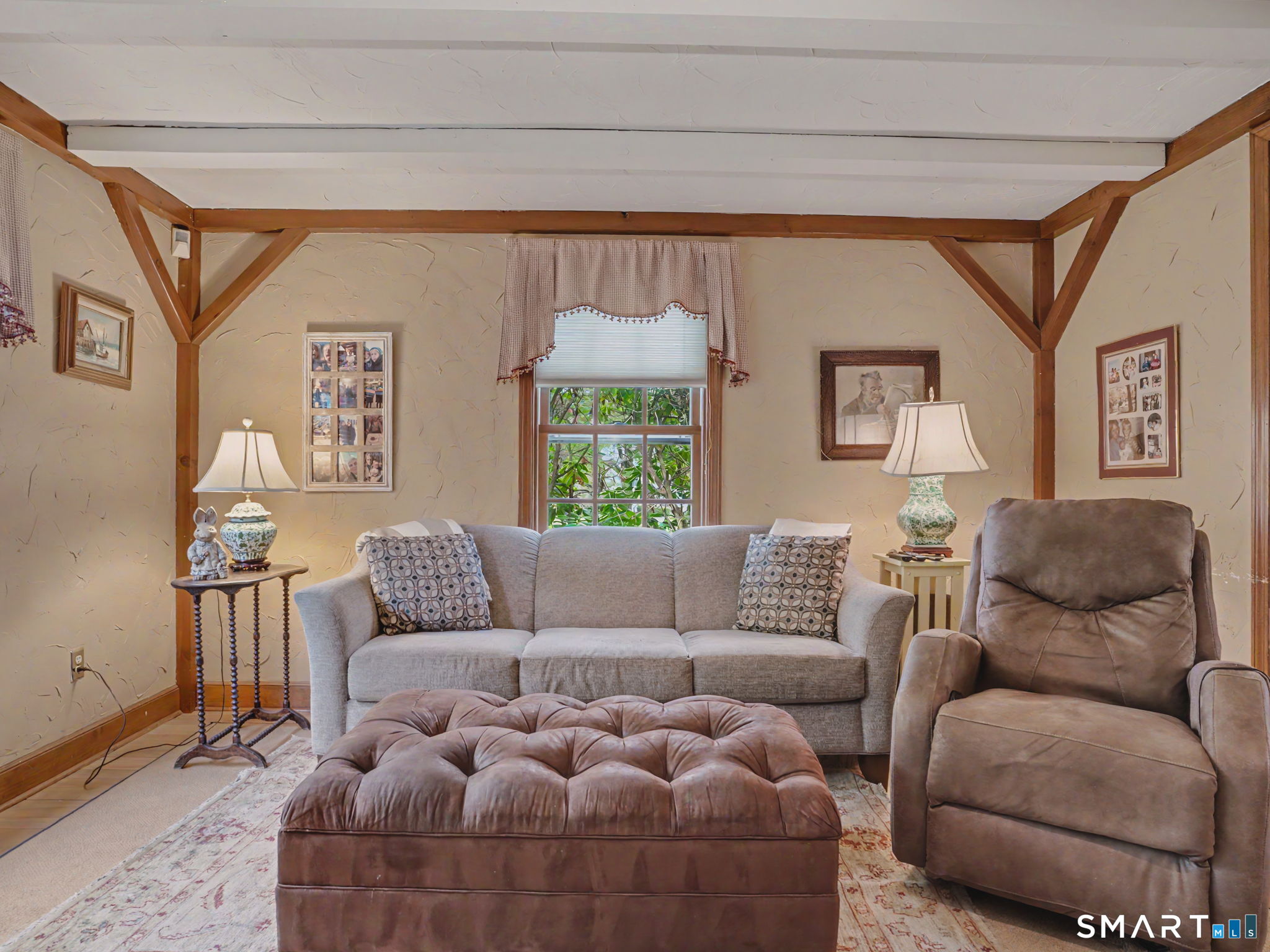 20 Chelsea Street Fairfield, CT 06824 - Photo 6 of 28 a living room with furniture and a large window