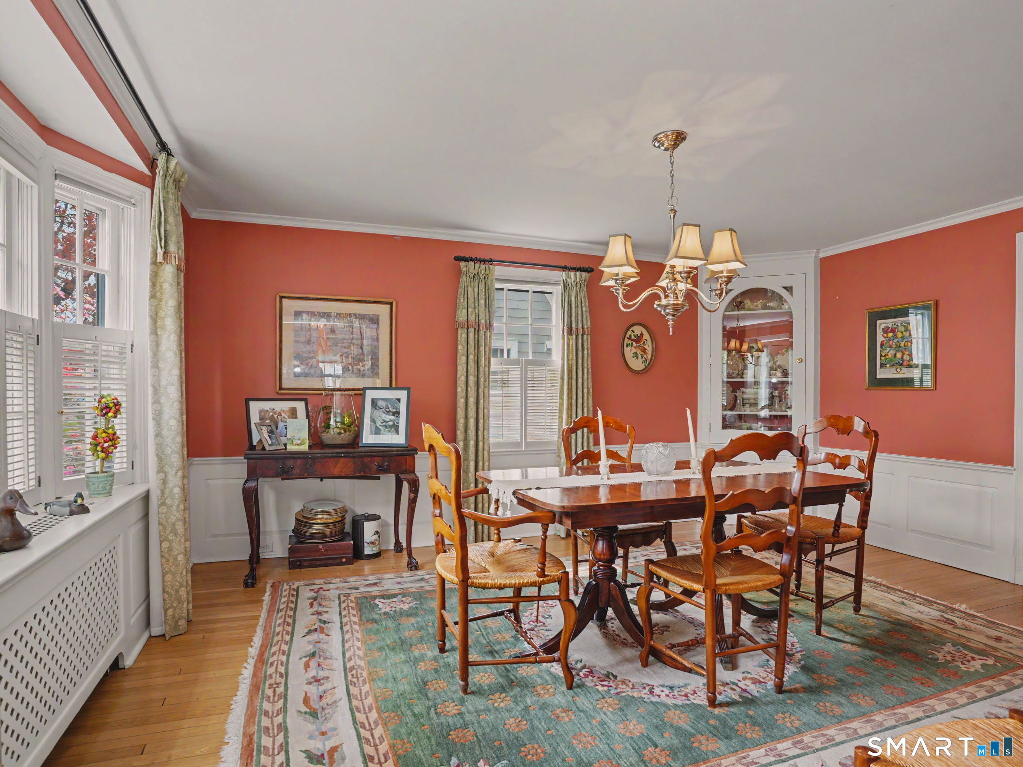 20 Chelsea Street Fairfield, CT 06824 - Photo 8 of 28 a view of a dining room with furniture window and wooden floor