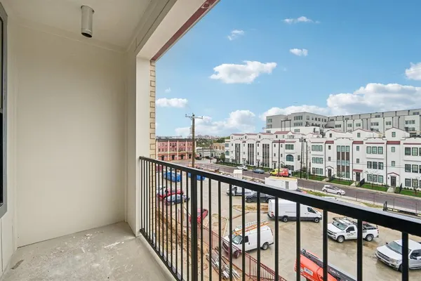 a view of city from a balcony