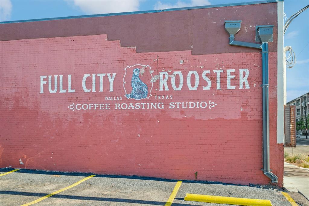 2016 South Ervay Street, Unit A2 Dallas, TX 75215 - Photo 26 of 35 a sign that is on the wall of building