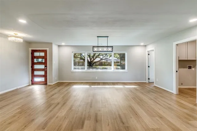 a view of kitchen with sink and microwave