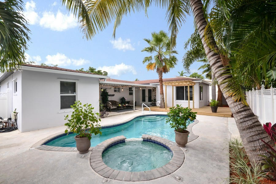 117 Gregory Road West Palm Beach, FL 33405 - Photo 10 of 11 Pool with Covered Patio