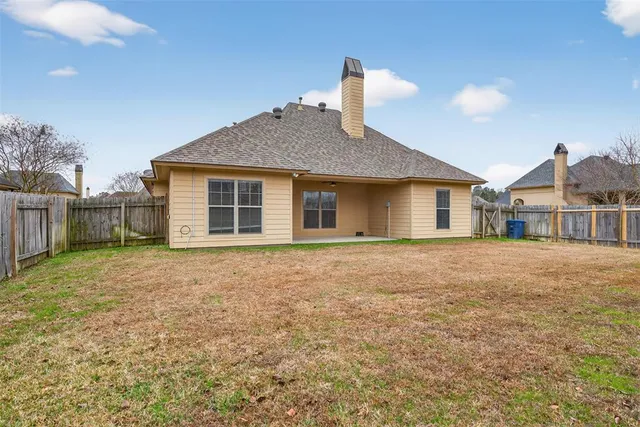 a house view with a garden space