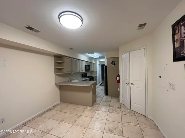 a bathroom with a toilet and a sink
