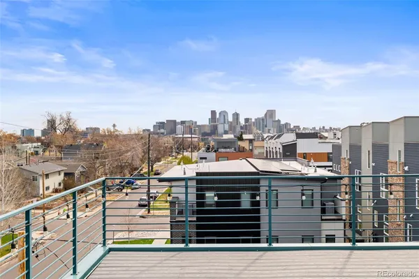 a view of a terrace with city view