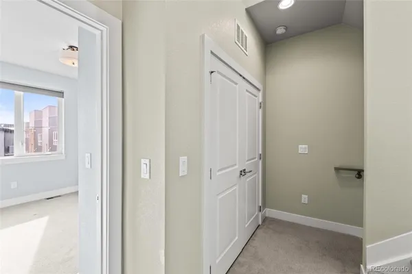 a kitchen with sink and window