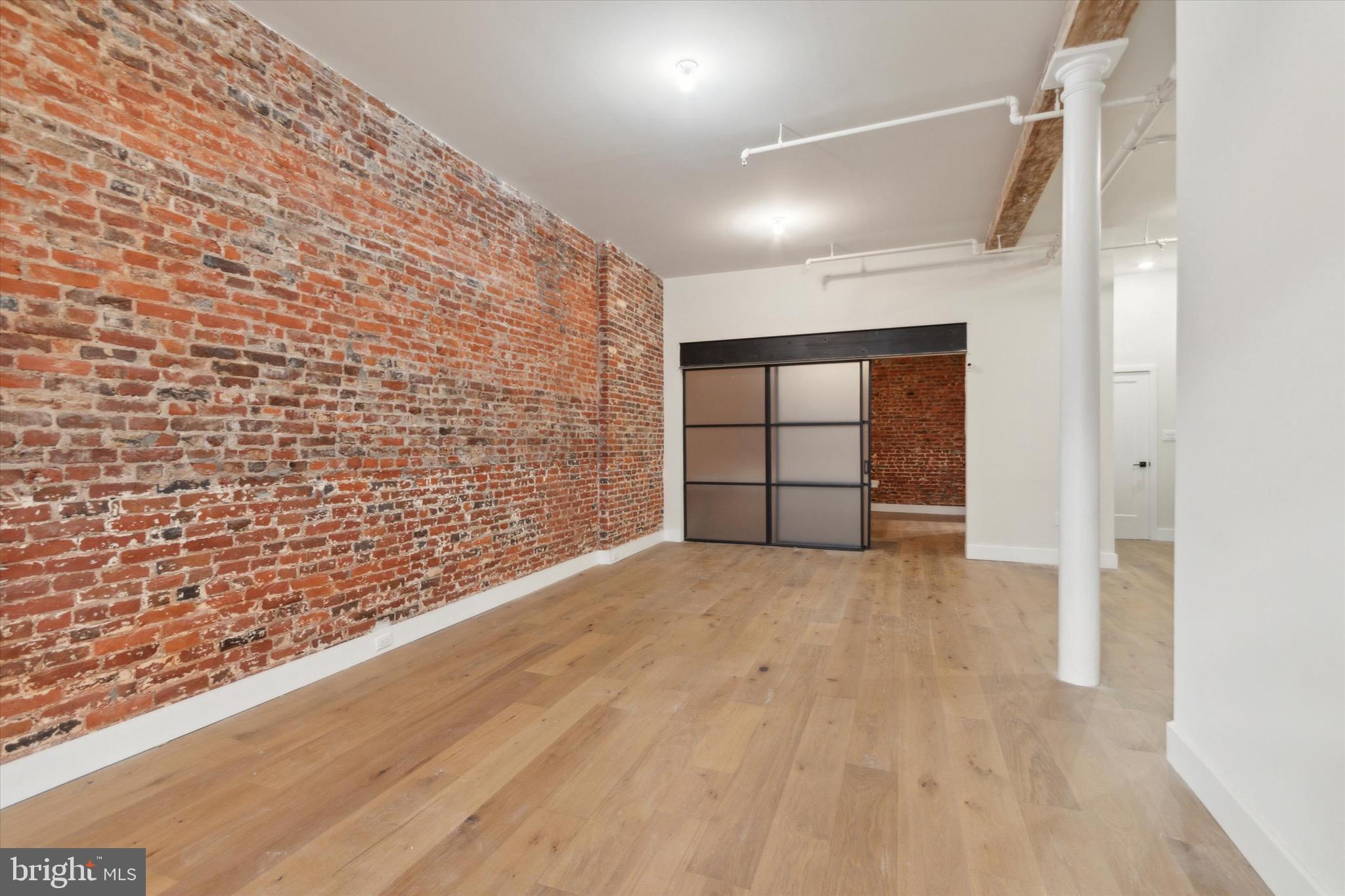 32 Strawberry Street, Unit 1 Philadelphia, PA 19106 - Photo 3 of 16 Livingroom/ #1 Bedroom Door