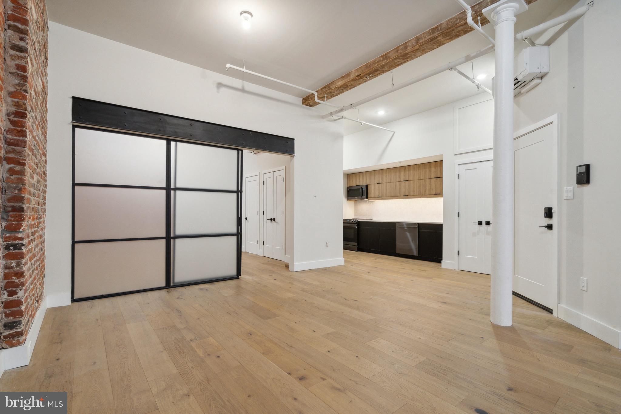 32 Strawberry Street, Unit 1 Philadelphia, PA 19106 - Photo 4 of 16 Livingroom/ #1 Bedroom Door