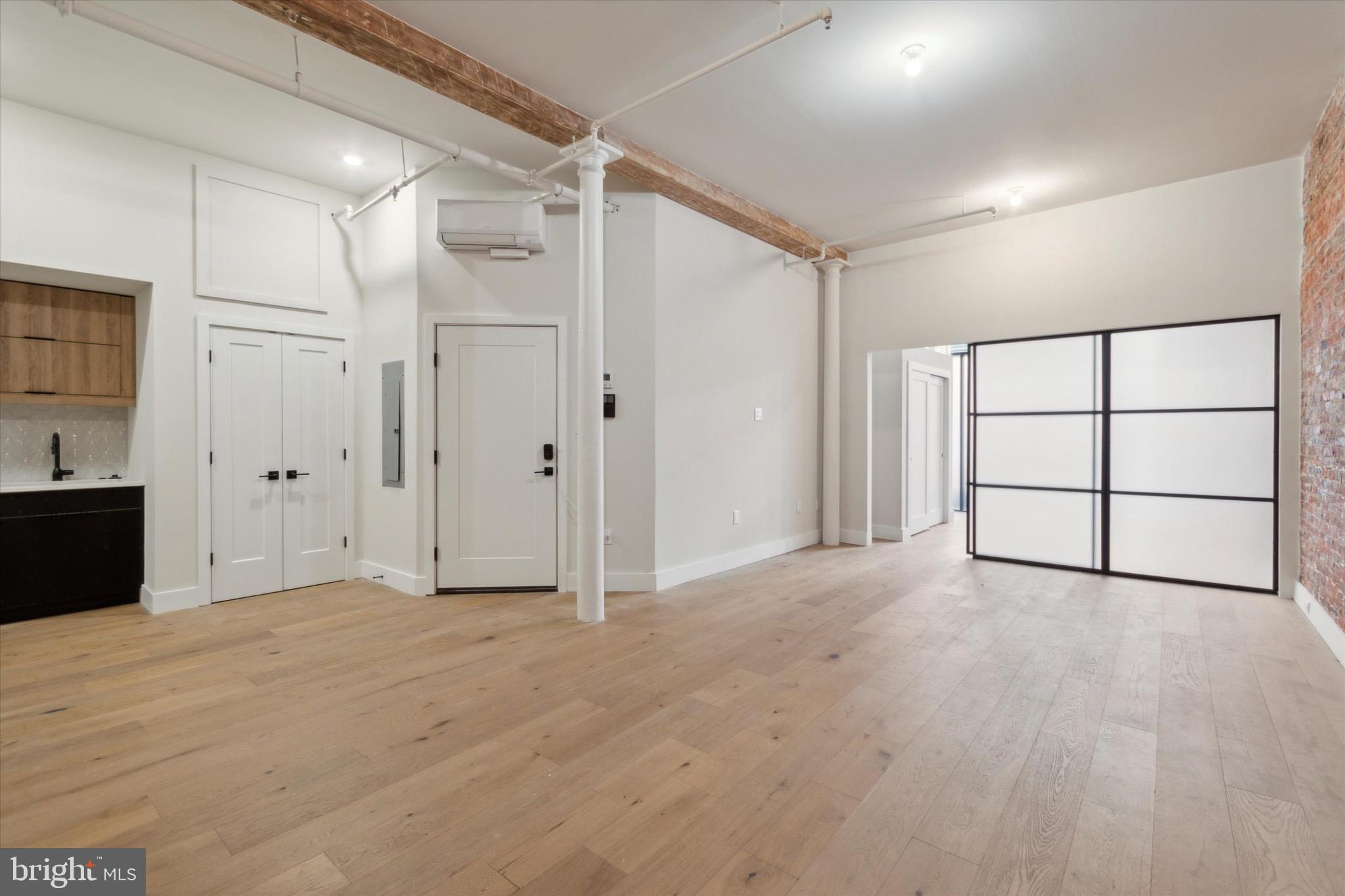 32 Strawberry Street, Unit 1 Philadelphia, PA 19106 - Photo 10 of 16 Livingroom Area / #2 Bedroom Door