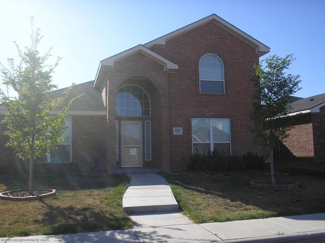 4804 Nimbus Lane Amarillo, TX 79110 - Photo 21 of 21 a front view of a house with garden