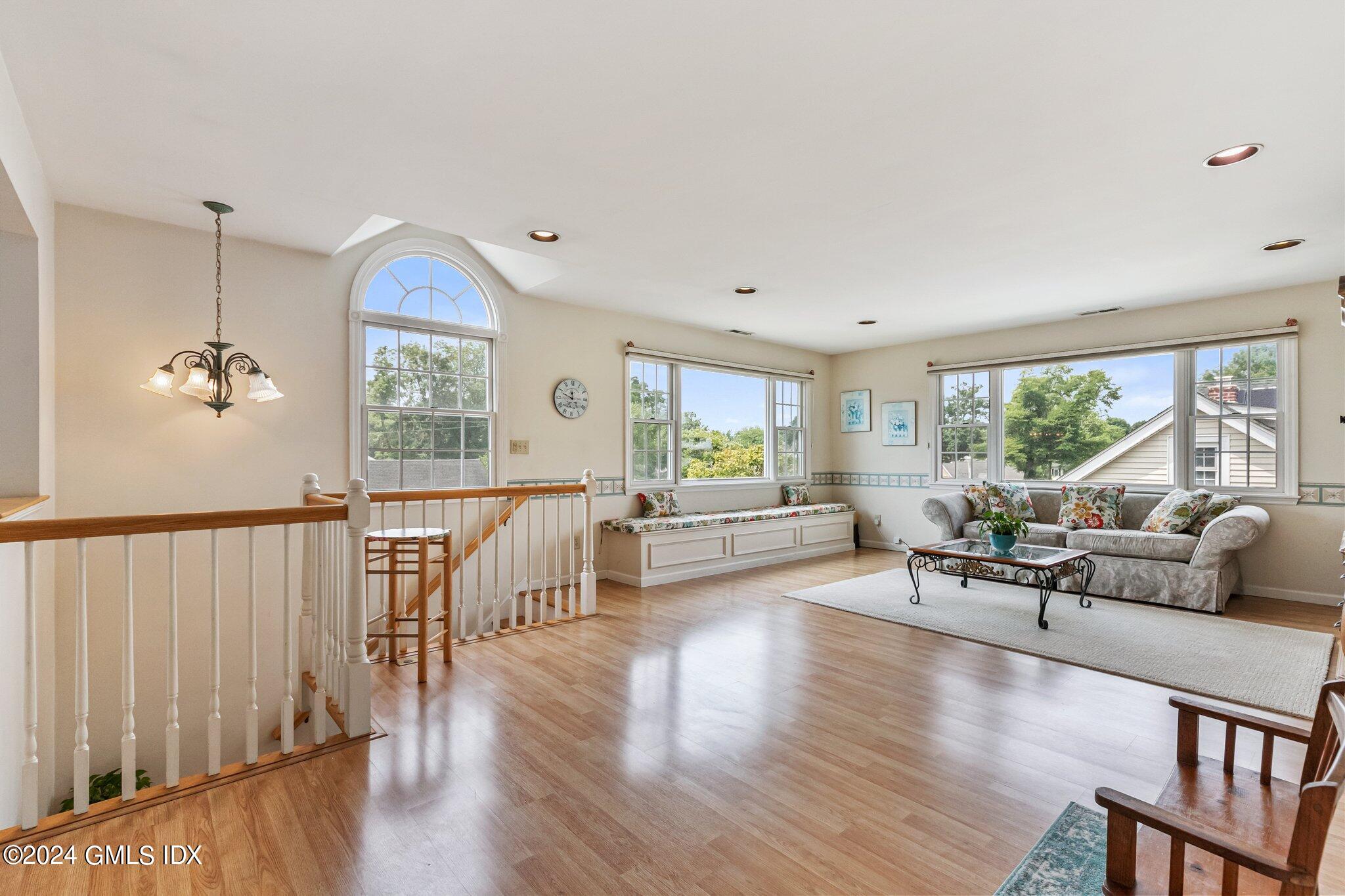 15 Thorn Hill Road Riverside, CT 06878 - Photo 16 of 30 a living room with furniture and a large window