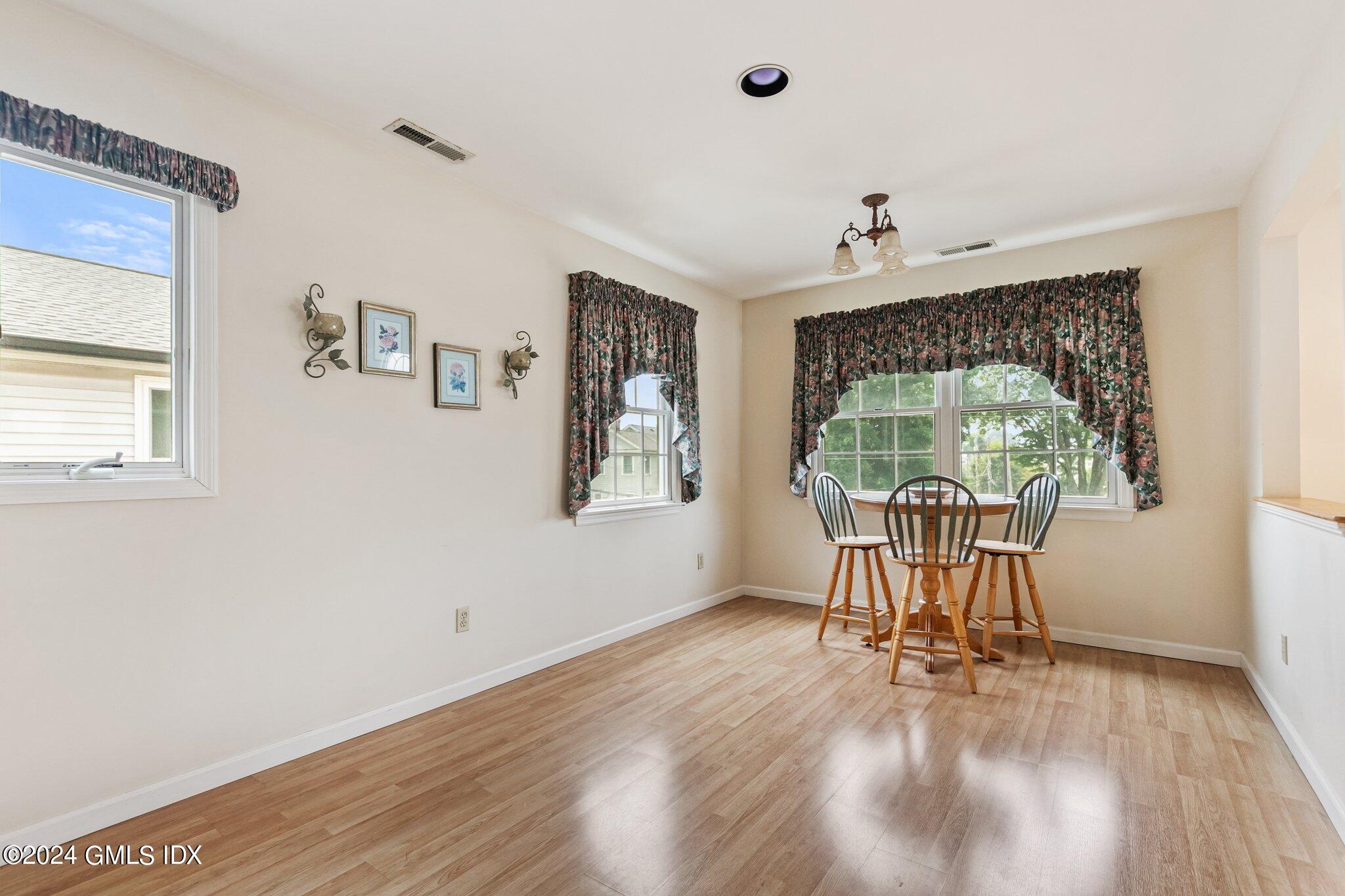 15 Thorn Hill Road Riverside, CT 06878 - Photo 18 of 30 a view of a dining room with furniture window and outside view