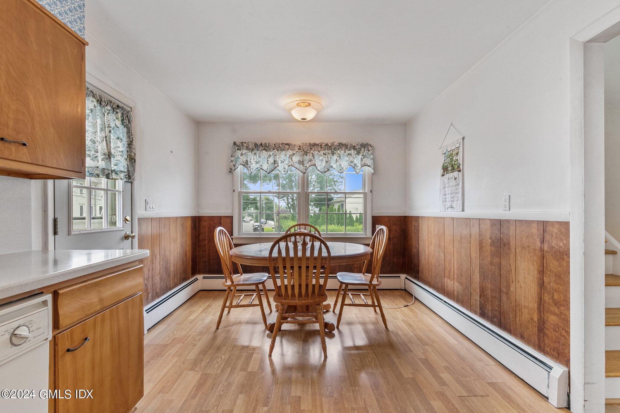 15 Thorn Hill Road Riverside, CT 06878 - Photo 8 of 30 a view of a dining room with furniture window and wooden floor