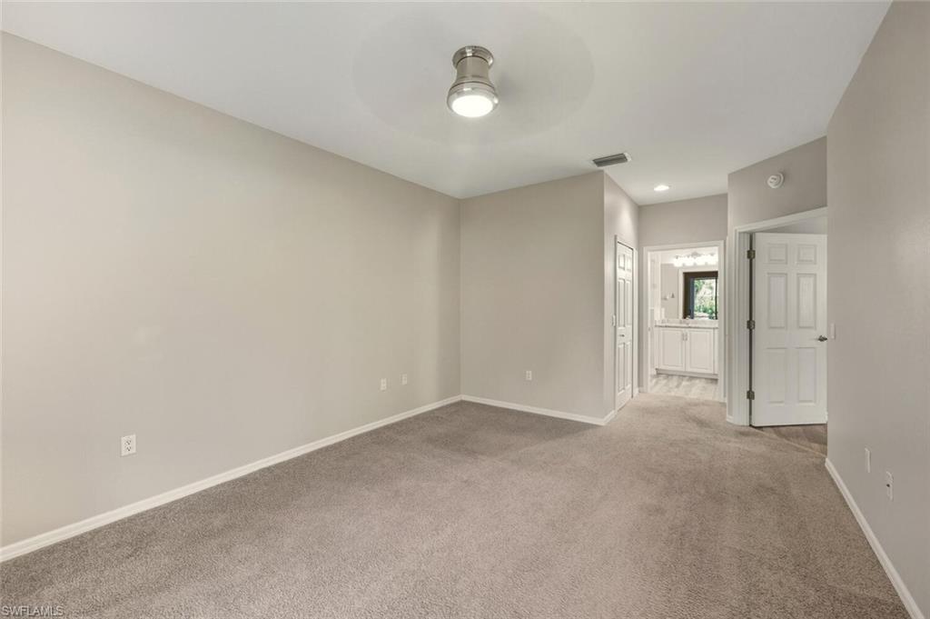 7005 Pinnacle Lane, Unit 1501 Naples, FL 34110 - Photo 11 of 34 Master Bedroom with bathroom access