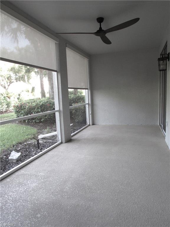 7005 Pinnacle Lane, Unit 1501 Naples, FL 34110 - Photo 30 of 45 a view of a room with window and a view of outdoor space