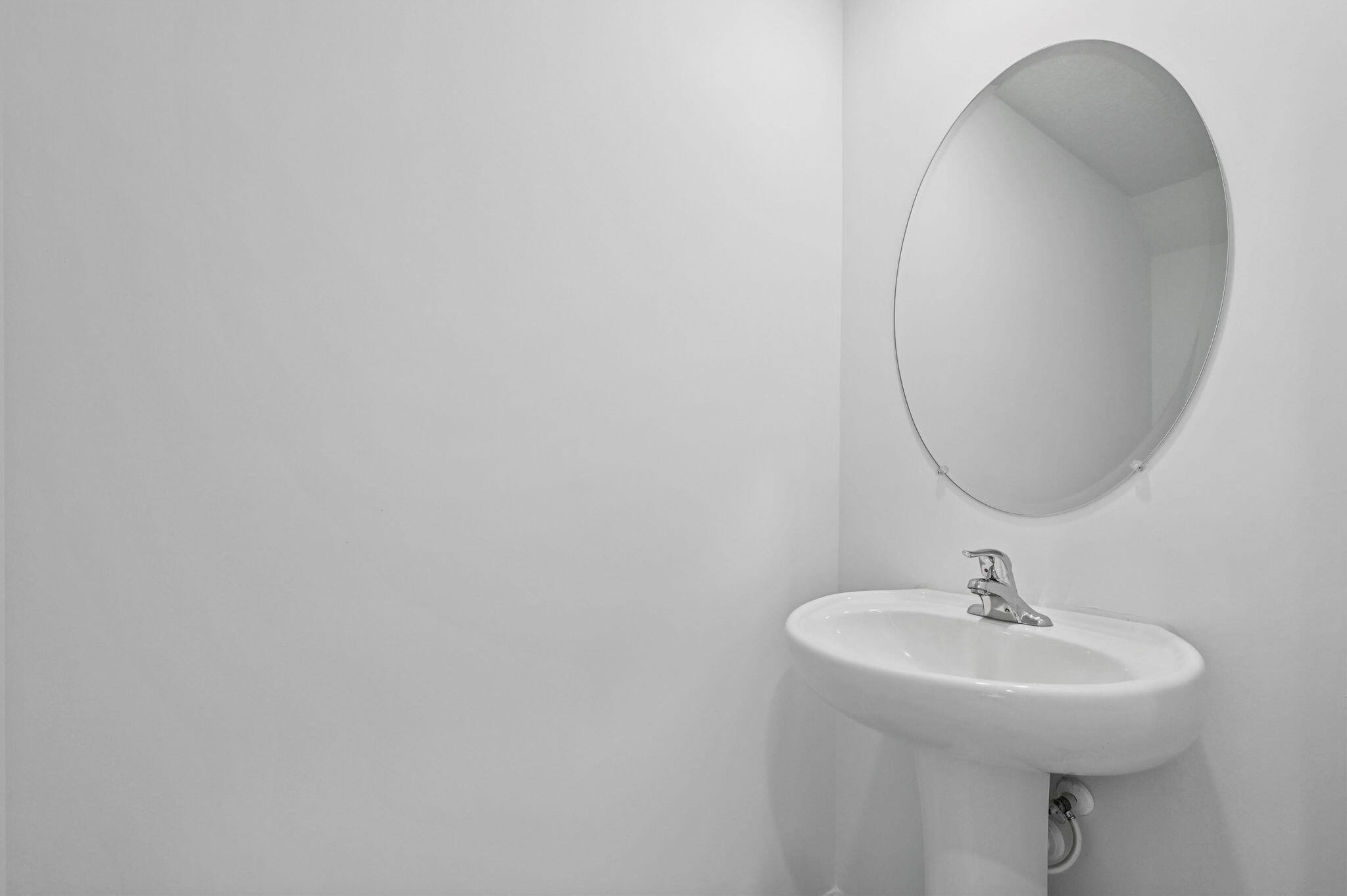 475 Salisbury Circle Fort Pierce, FL 34982 - Photo 13 of 30 a bathroom with a sink and a mirror