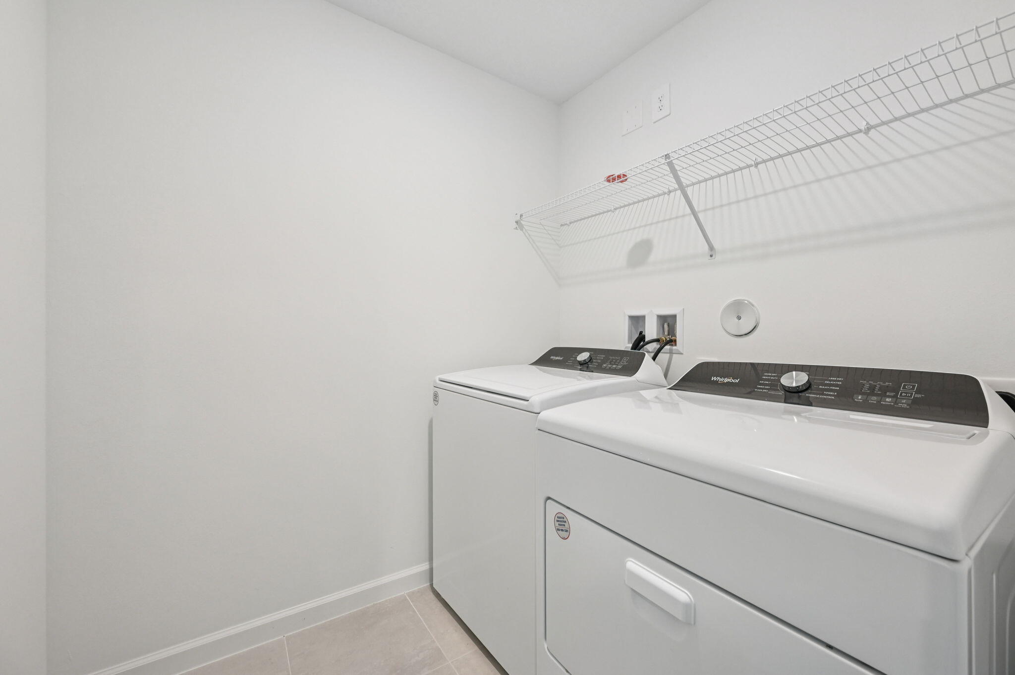 475 Salisbury Circle Fort Pierce, FL 34982 - Photo 20 of 30 a utility room with dryer and washer