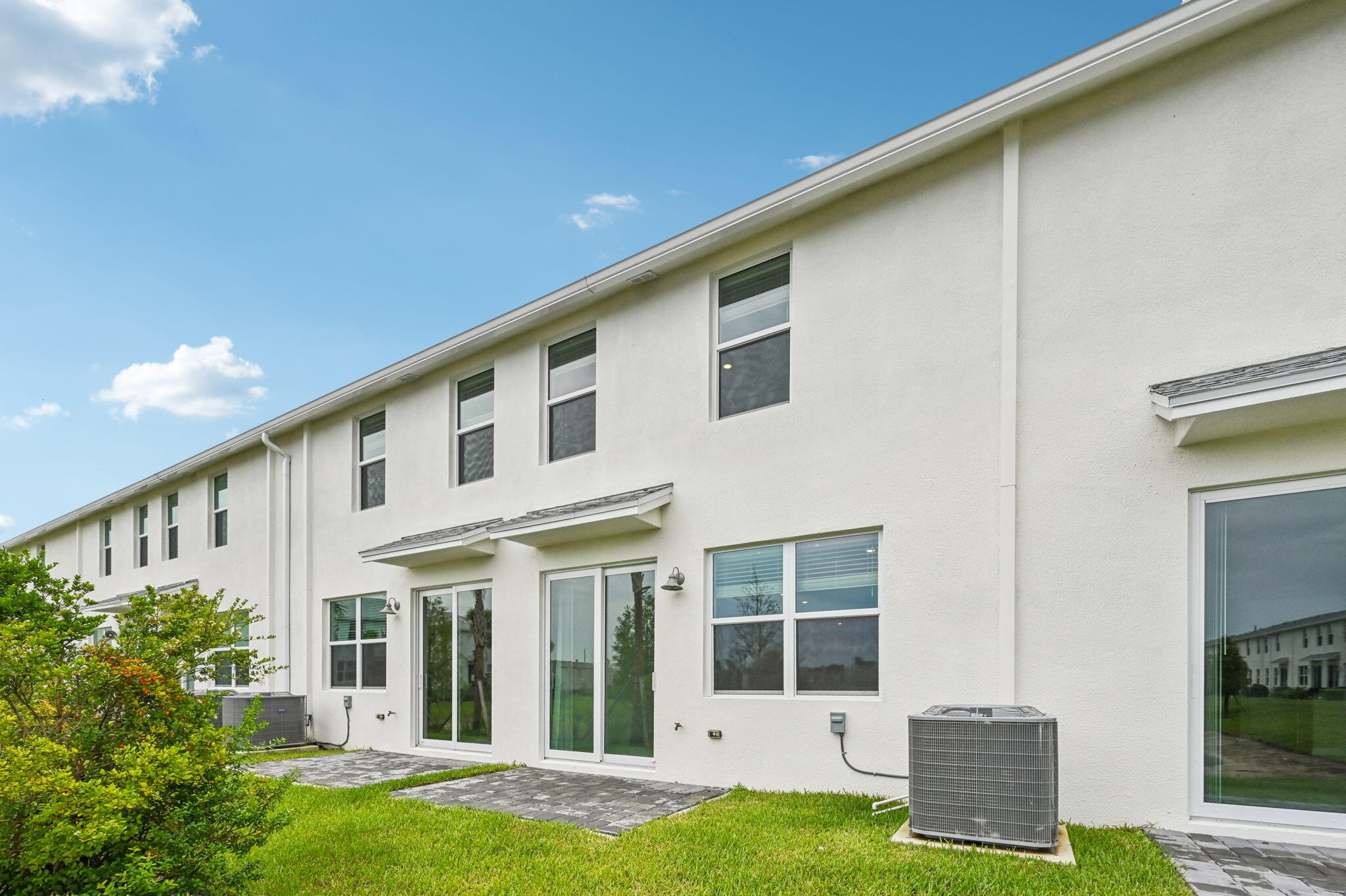 475 Salisbury Circle Fort Pierce, FL 34982 - Photo 27 of 30 a front view of a house with a yard