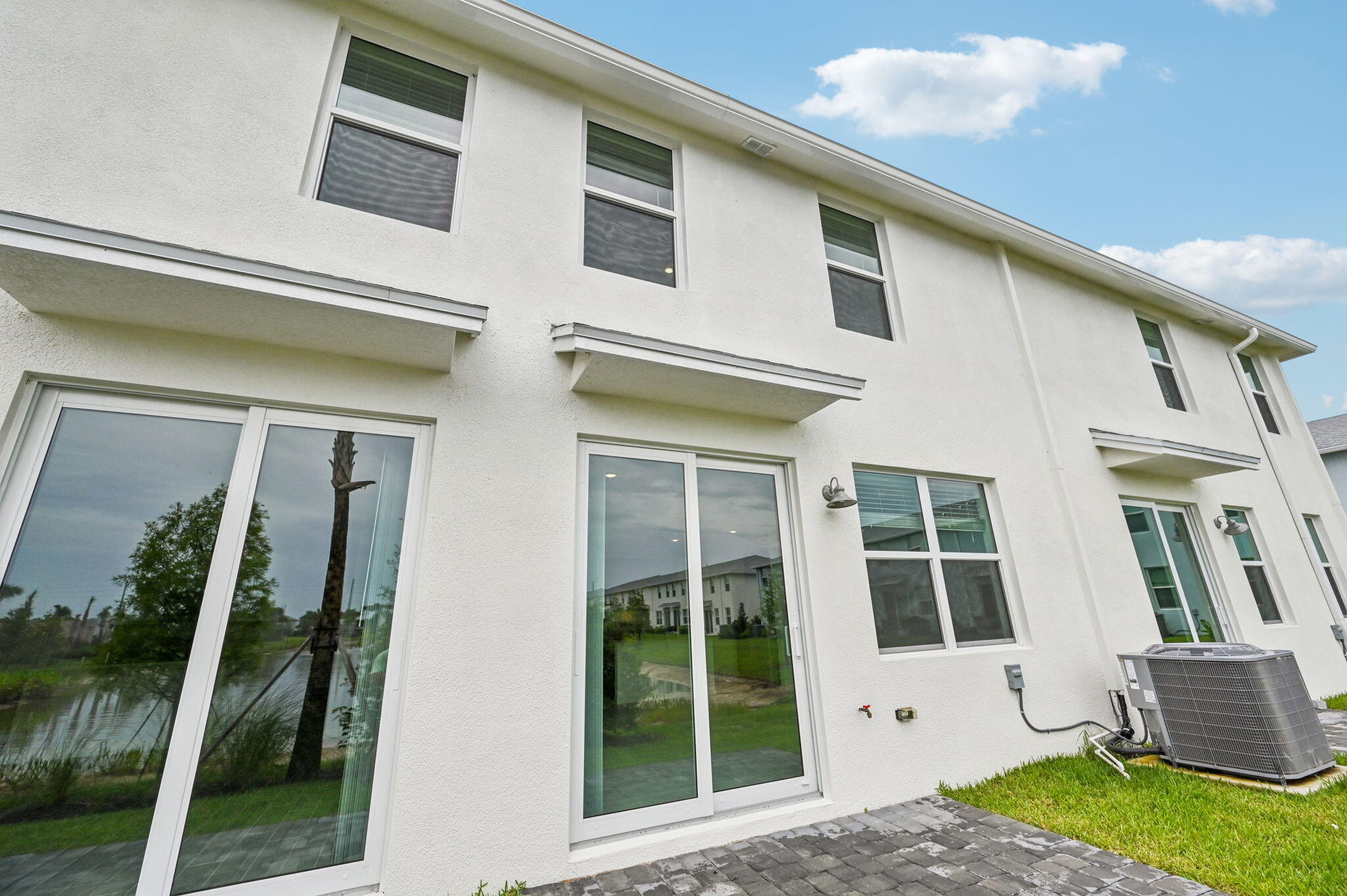 475 Salisbury Circle Fort Pierce, FL 34982 - Photo 28 of 30 a front view of a house with a yard
