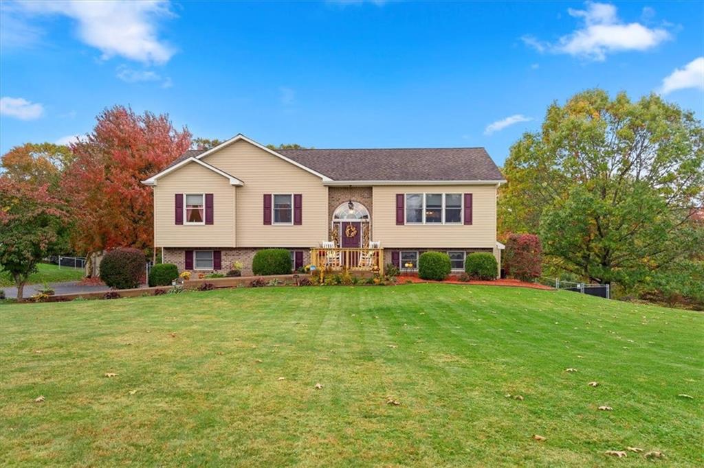 131 Double Road Renfrew, PA 16053 - Photo 1 of 25 a view of a house with a backyard