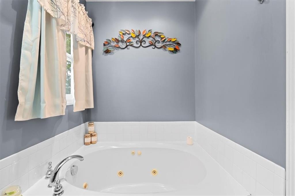 131 Double Road Renfrew, PA 16053 - Photo 14 of 25 a bathroom with a bathtub and a shower
