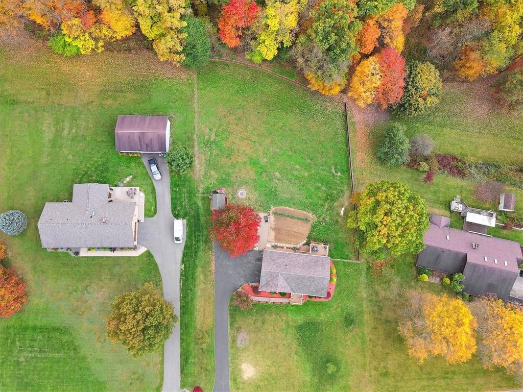 131 Double Road Renfrew, PA 16053 - Photo 3 of 25 an aerial view of a house with a garden and trees