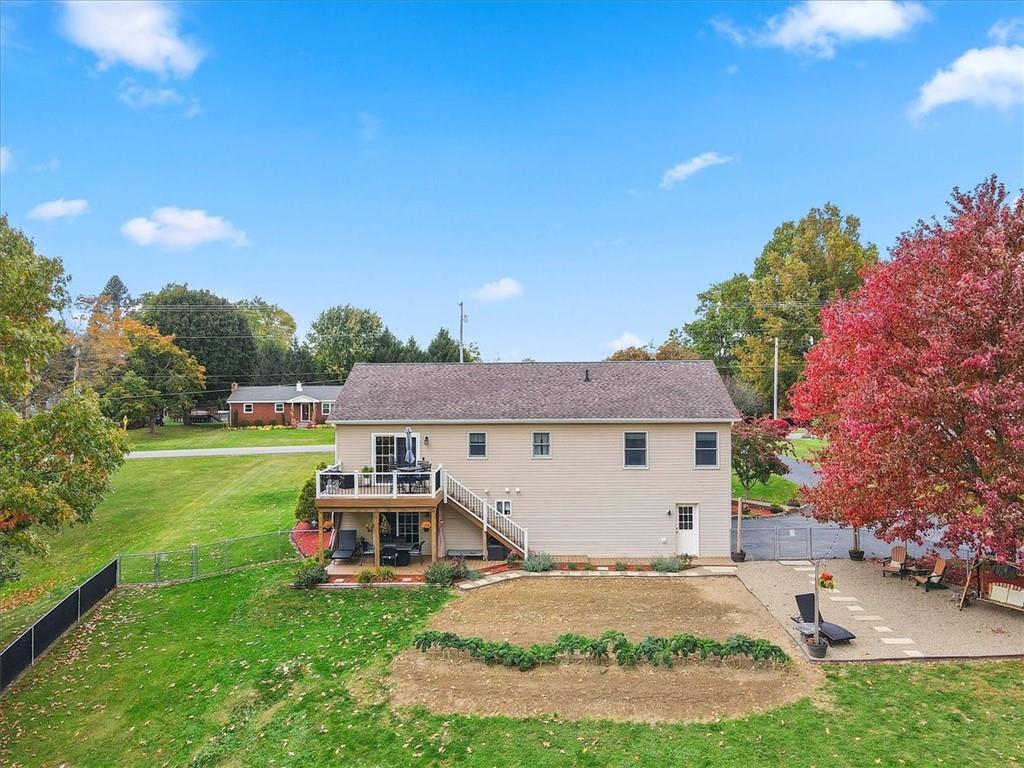 131 Double Road Renfrew, PA 16053 - Photo 5 of 25 a front view of a house with garden