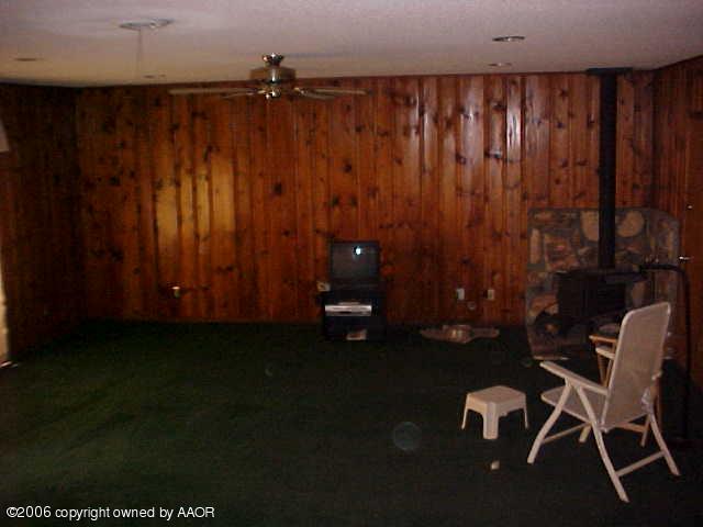 4420 South Ong Street Amarillo, TX 79110 - Photo 3 of 12 a view of a room with furniture and wooden floor