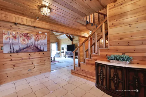 a view of entryway with a front door