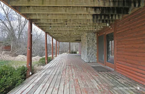 a view of porch with seating space