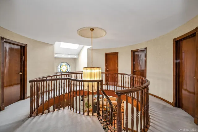 a view of bedroom with furniture and a window