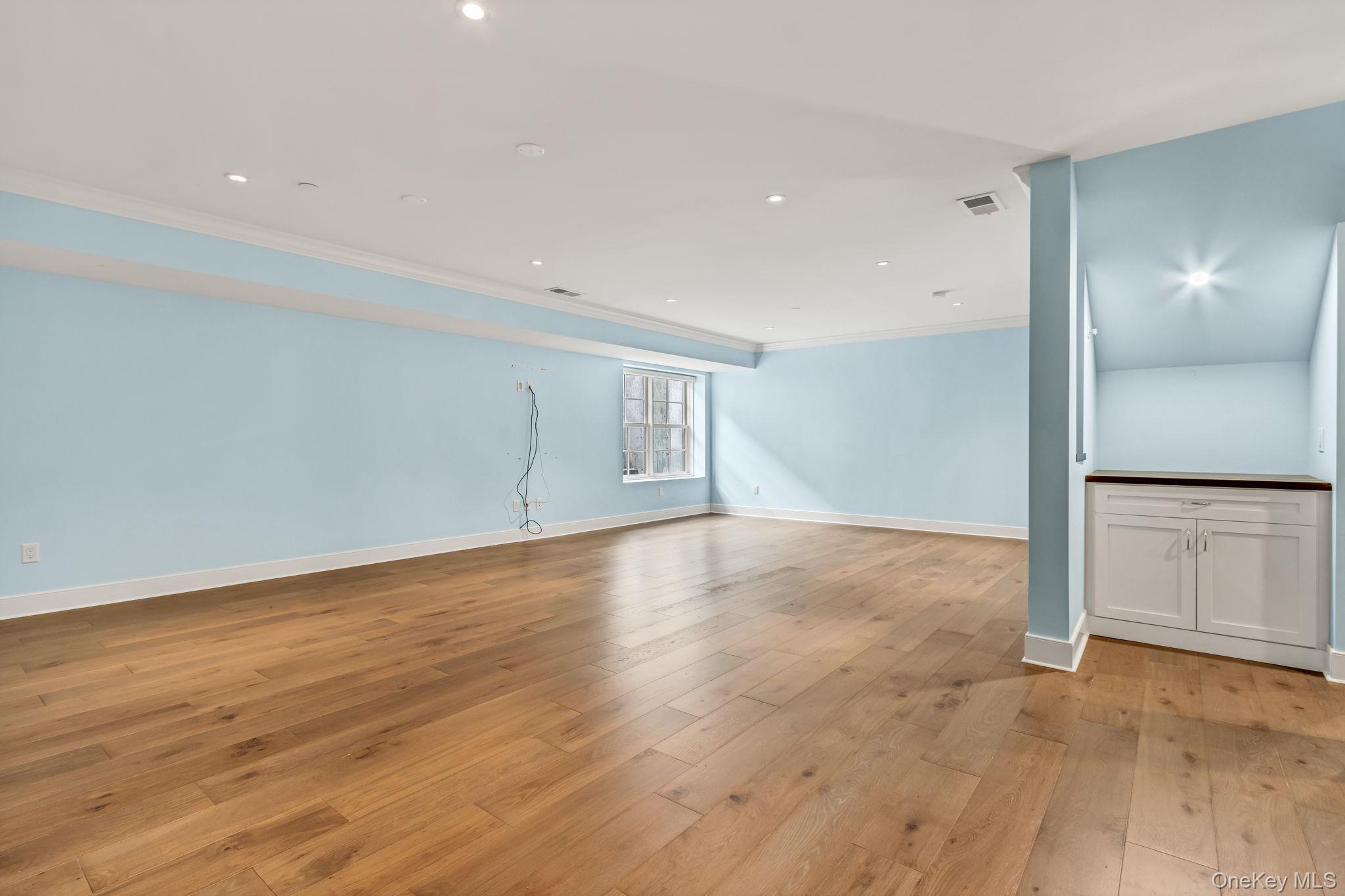 21 Honeysuckle Lane Rye Brook, NY 10573 - Photo 30 of 48 a view of empty room with wooden floor