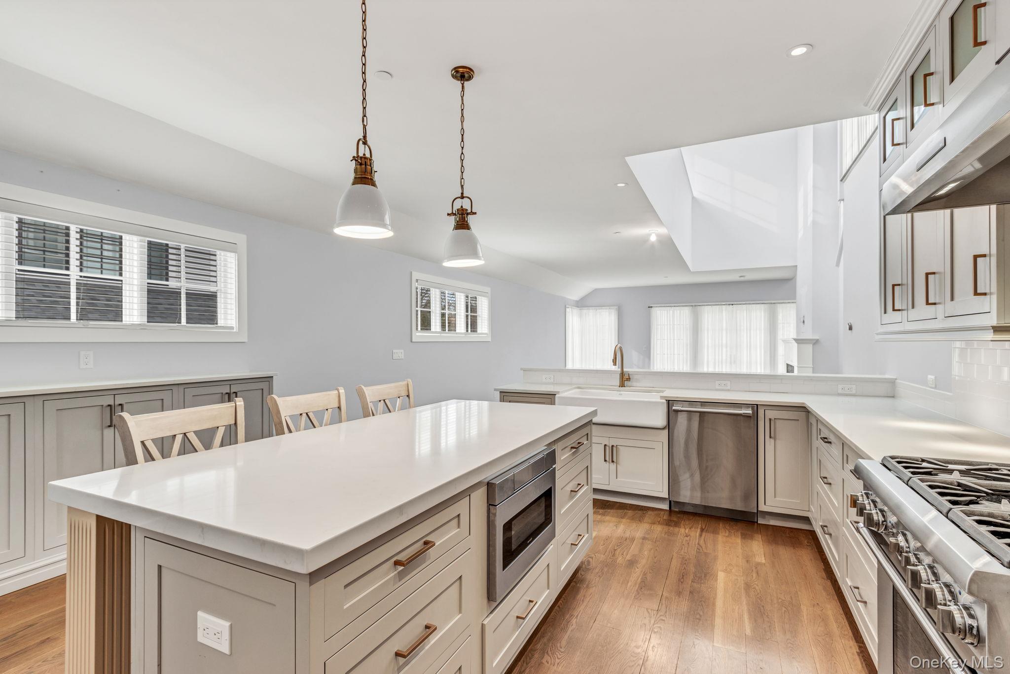 21 Honeysuckle Lane Rye Brook, NY 10573 - Photo 5 of 48 a kitchen with a stove and a sink