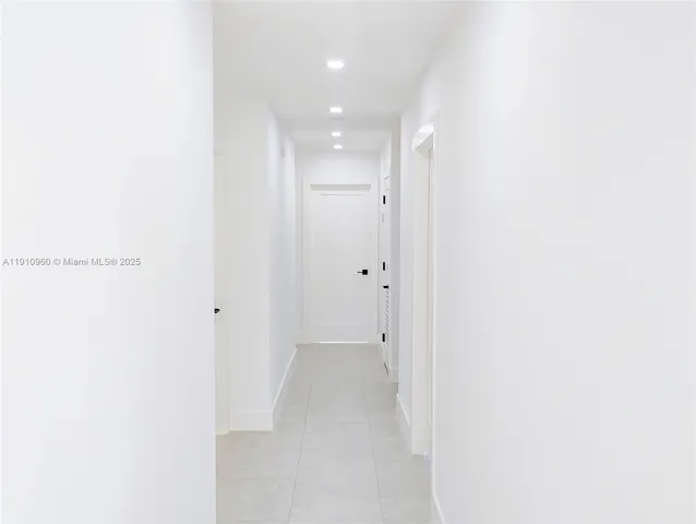 a view of a room that has a window