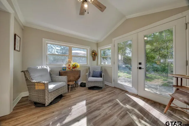 a bed room with furniture and a window