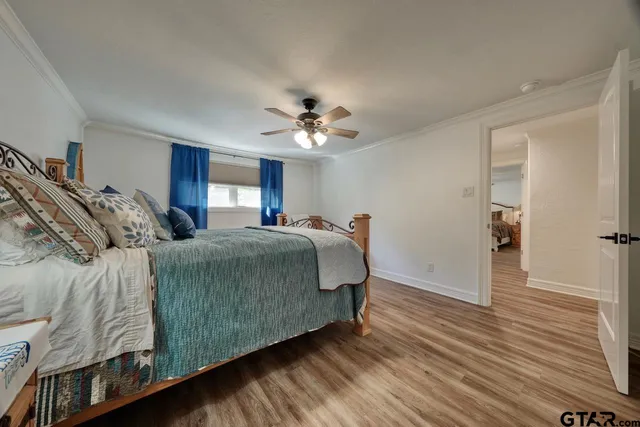 a bed room with a bed and a couch