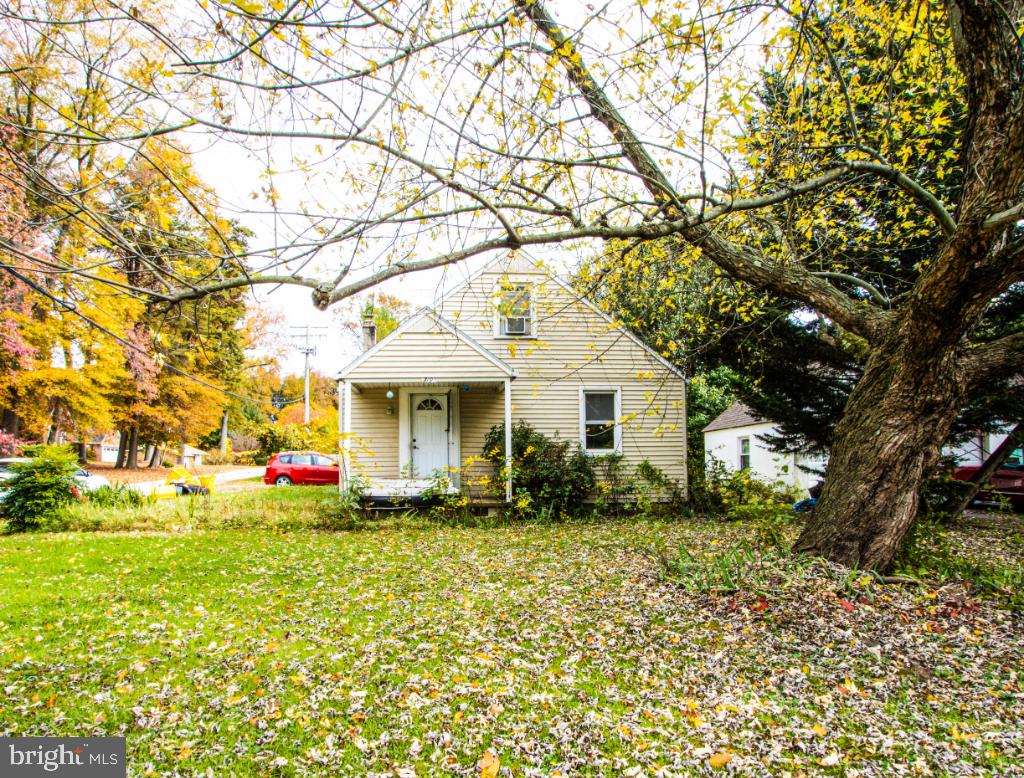 719 Wampler Road Baltimore, MD 21220 - Photo 1 of 18 a front view of house with yard